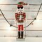 Ornativity Christmas Skier Man Nutcracker &#x2013; Red and Green Wooden Nutcracker Guy with Ugly Sweater and Ski Sticks in Skiing Pose Xmas Themed Holiday Nut Cracker Doll Figure Decorations